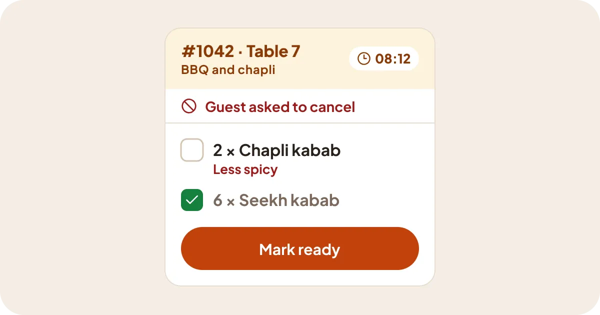 A kitchen ticket with a timer, the dishes to cook and a Mark ready button.